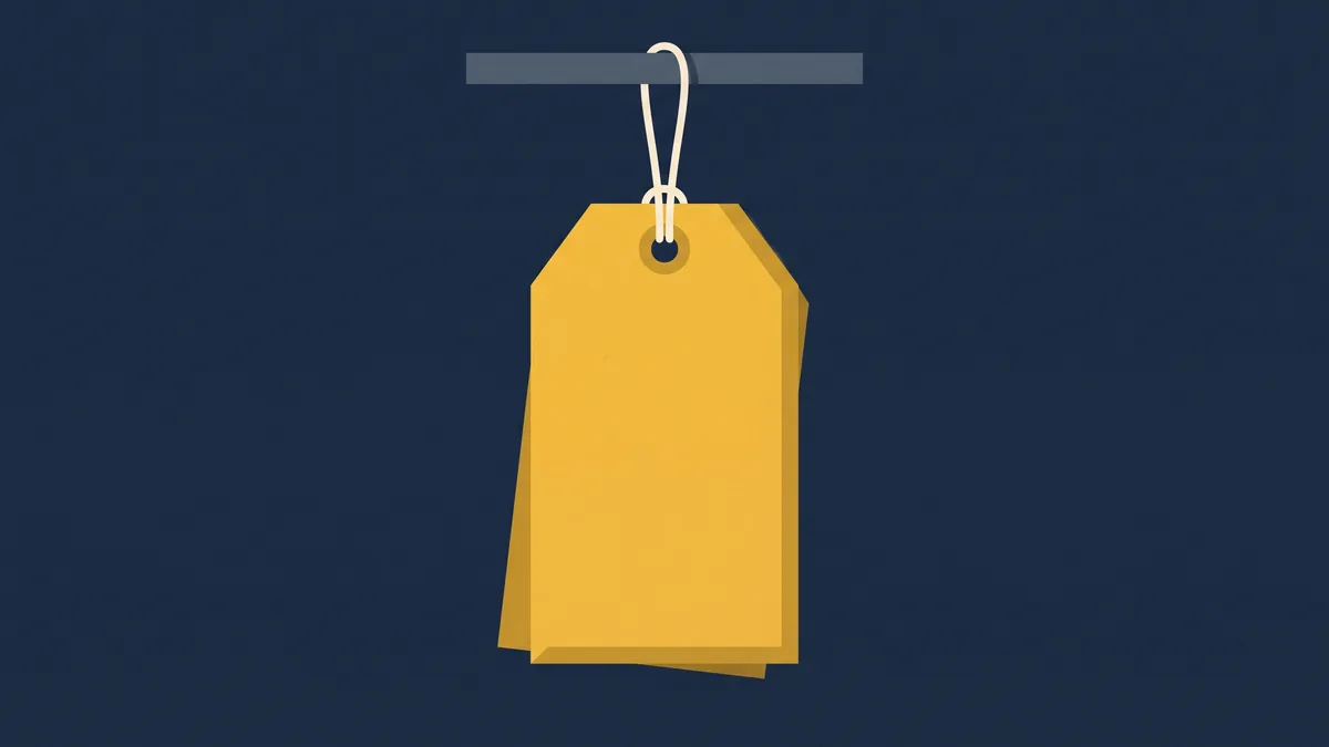 A price tag hanging from a string with a blank face